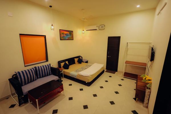 Living room with sofa and bed